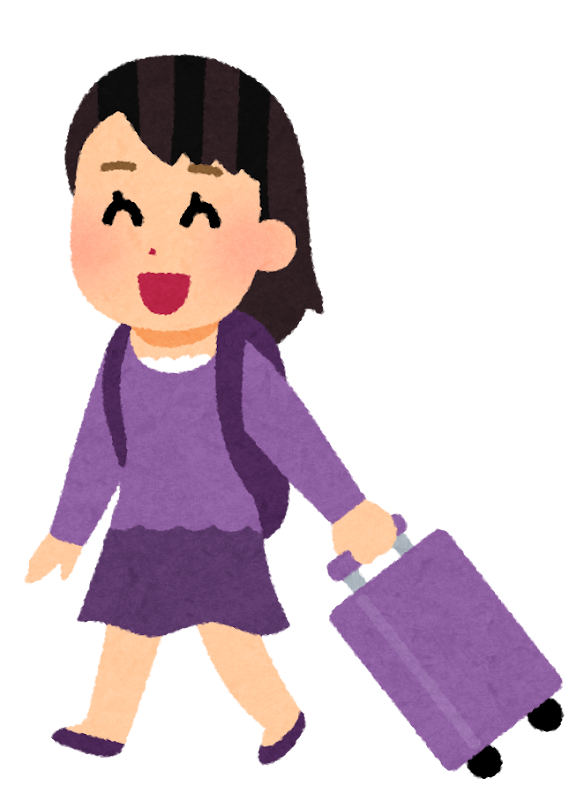スーツケースを引く女性