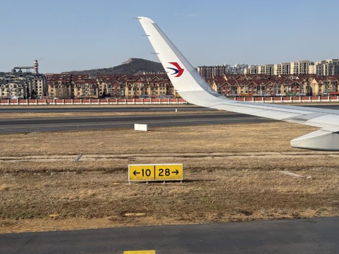 大連周水子国際空港に到着